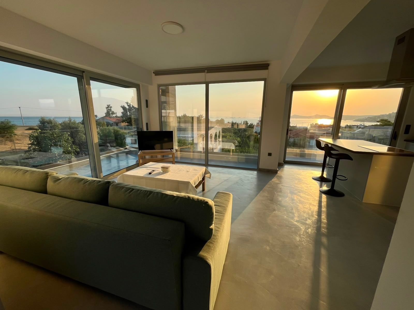 The living room at sunset, glowing with the last light off the gulf.